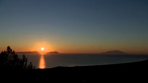 Seascape sunset over mountains Stock Footage 114552336