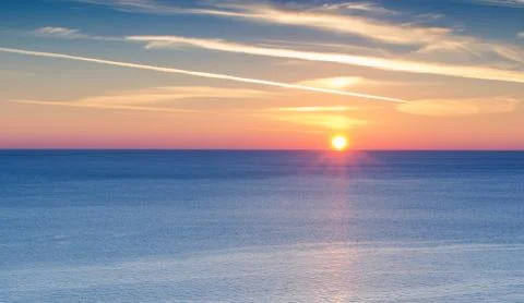 Seascape with sunset Stock Photos