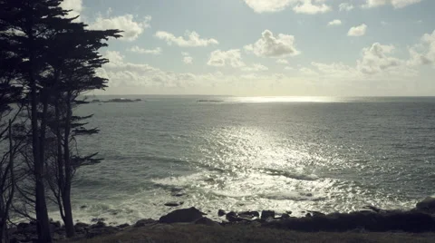 Seascape in time-lapse with cumulus clouds running over the bay. 4K Stock Footage 57784954