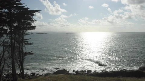 Seascape in time-lapse with cumulus clouds running over the bay. 4K Stock Footage 57785672