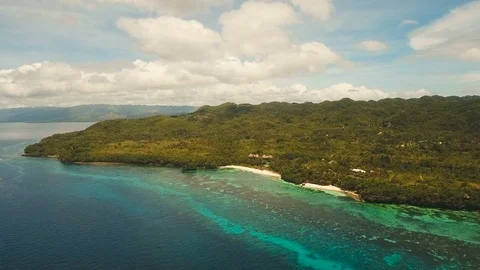 Seascape with tropical island, beach, resort, hotels. Bohol, Anda area Stock Footage