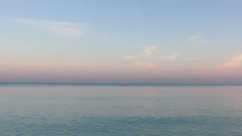 Seascape at Twilight with Low Angle Horizon and Muted Sky Colors 4K Video stock 332135152