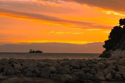 Seascape, view of the sea surface with a ship sailing in the distance, larg.. Stock Photos