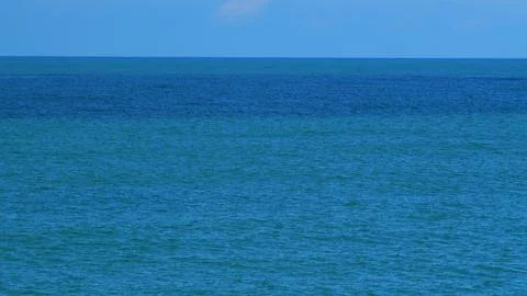 Seascape View. Soft Wave Of Emerald Clear Sea. Clear Blue Turquoise Water. Pan. Stock Photos