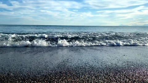 Seascape with water surface texture, foamy waves close-up Stock Footage 261757027