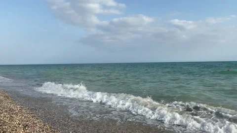 Seascape with waves and a pebble beach Video stock 156293071