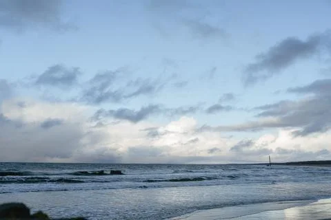 Seascape with waves, sandy beach Stock Photos