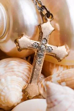 Seashell Background with Cross Stock Photos