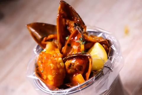 Seashell Bucket specials served isolated on background top view food Stock Photos