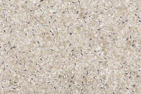 Seashell seed beads background. Stock Photos