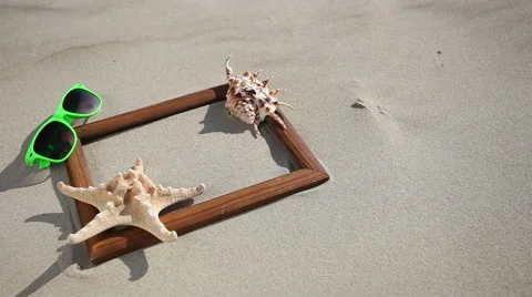 Seashell, starfish and sunglasses on the beach motorized slider. 1080p. Stock Footage 39962884