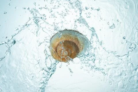 Seashell water splash Stock Photos