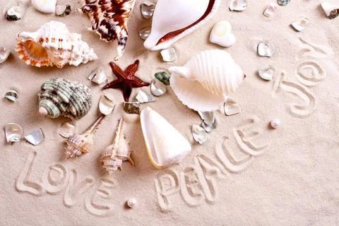Seashells in sand with text seashells in sand with text as a background ,m... Stock-Fotos