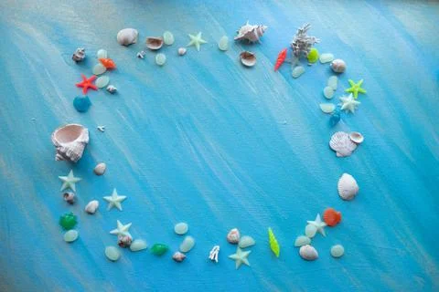 Seashells summer background. rectangular frame. Many different seashells Stock Photos