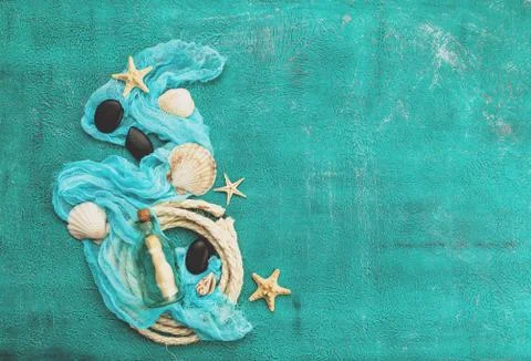 Seashells on turquoise background Stock Photos