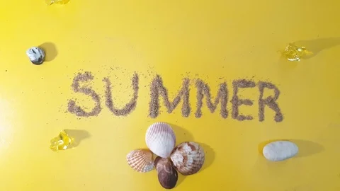 Seashells on a yellow background sand and summer vacation. Stock Footage 107565258