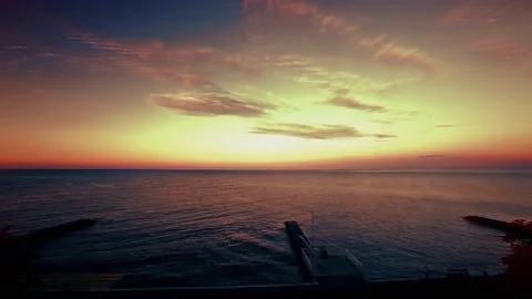 The seashore against the background of the evening sunset view of the moon Stock Footage 151262201