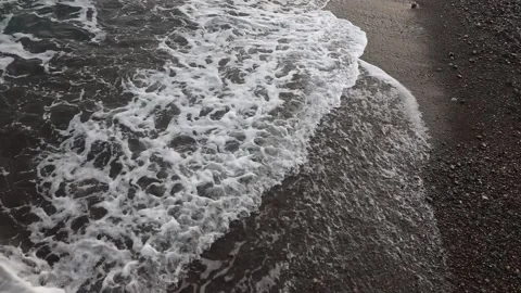 Seashore and waves, rocky beach, pebbles on the shore, calm sea view from above Stock Footage 166645240