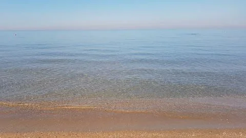 Seashore during calm Stock Photos