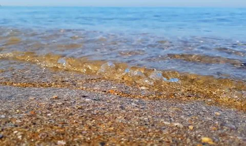 Seashore during calm Stock Photos