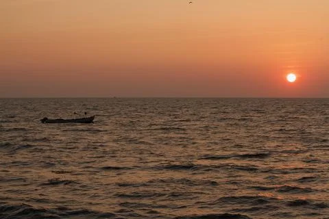 From seashore during sunset Stock Photos