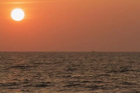 From seashore during sunset Stock Photos