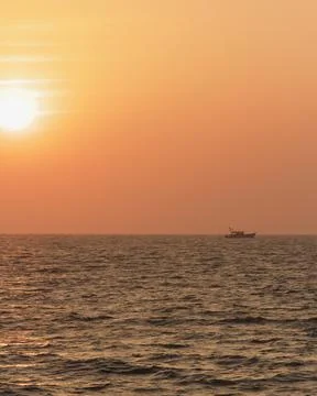 From seashore during sunset Stock Photos