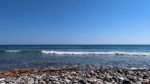 Seashore of Libyan sea with small waves during a sunny day with clear sky Stock Footage 152552585