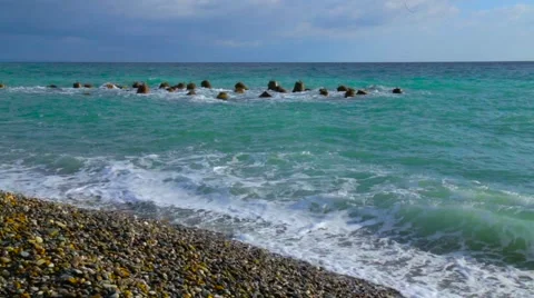 Seashore pebble beach Stockbeeldmateriaal 65338353