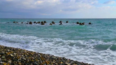 Seashore pebble beach Stockbeeldmateriaal 65338411