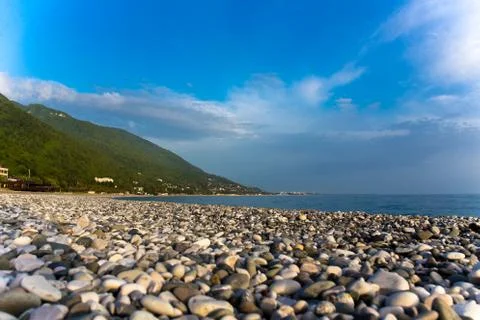 Seashore pebble beach Stock Photos