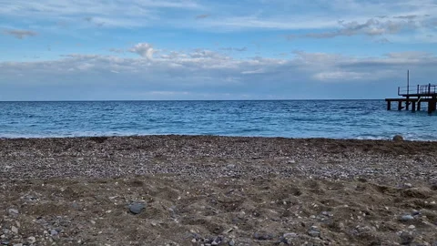 The seashore with a pier. Video stock 288487706