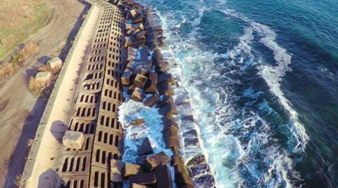 Seashore with Rocks as Breakwaters Stock Footage 58831272