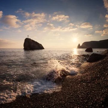 Seashore at sunset Stock Photos