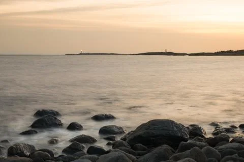 Seashore sunset Stock Photos