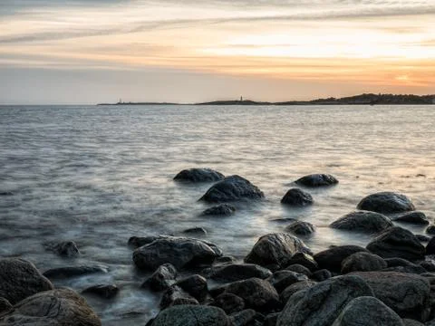 Seashore sunset Stock Photos