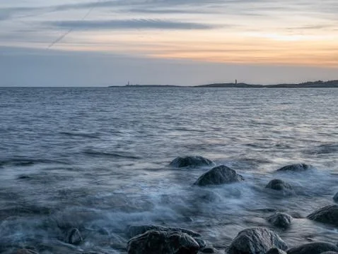Seashore sunset Stock Photos