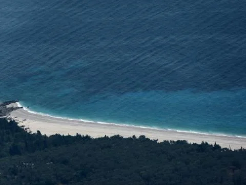 Seashore of a virgin beach Stock Photos