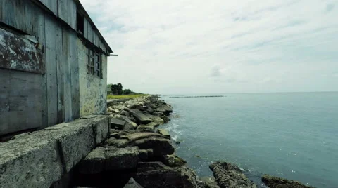 Seaside Beach With Old House Video Footage 4K hight quality Stock Footage 50802829