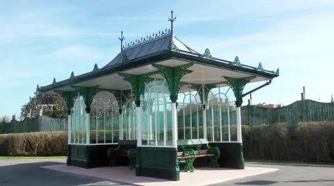 Seaside beach shelter old fashioned decorative cast iron victorian  promenade Stock Footage 48652180