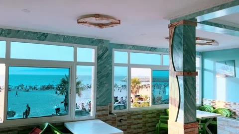 Seaside Café Window View Over Busy Beach dalya, Northern Morocco Stock Footage 318594039