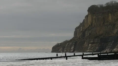 Seaside cliff and the beach 스톡 동영상 85392719