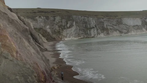 Seaside Cliffs panning over to the Sea Stock Footage 90356721