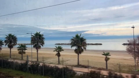 Seaside coastline seen from the train Stock Footage 328361407