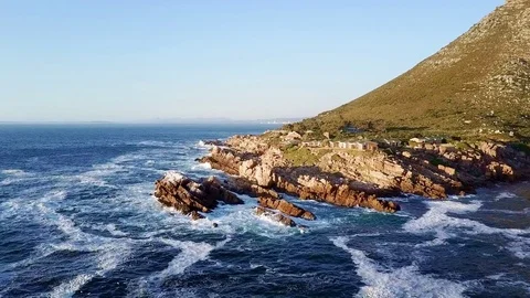 Seaside cottage on the rocks Stock Footage 71614561