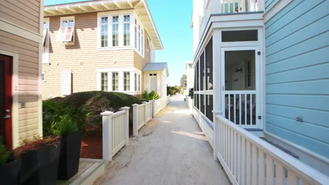 Seaside, Florida path sand sidewalk by houses in new urbanism Stock Footage 160173864
