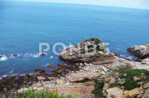 Seaside with great rocks at chinese city Hongkong Stock Photos
