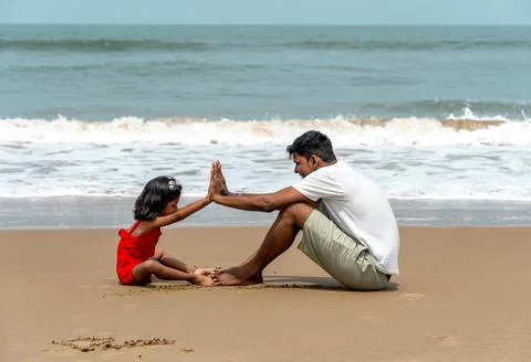 Seaside High Five Joyful Bonding Stock Photos