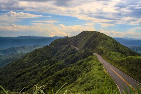 The seaside mountain sunset Stock Photos