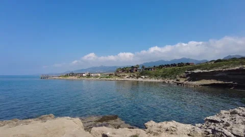 Seaside, palm trees, clouds and resort. Fresh air, mountain and sea views. Stock Footage 278104824